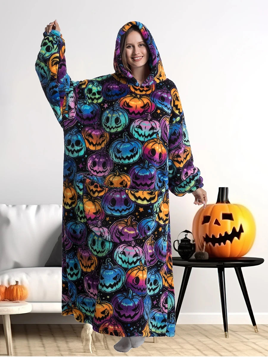 Pumpkin hoodie blanket worn in a cozy living room