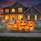 Halloween inflatable pumpkins lit up in front of a house so homeowners can picture the decoration at their own home