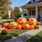 7 ft Halloween inflatable pumpkins shown full size on a front lawn in daylight, seven connected light-up jack-o-lanterns yard decoration