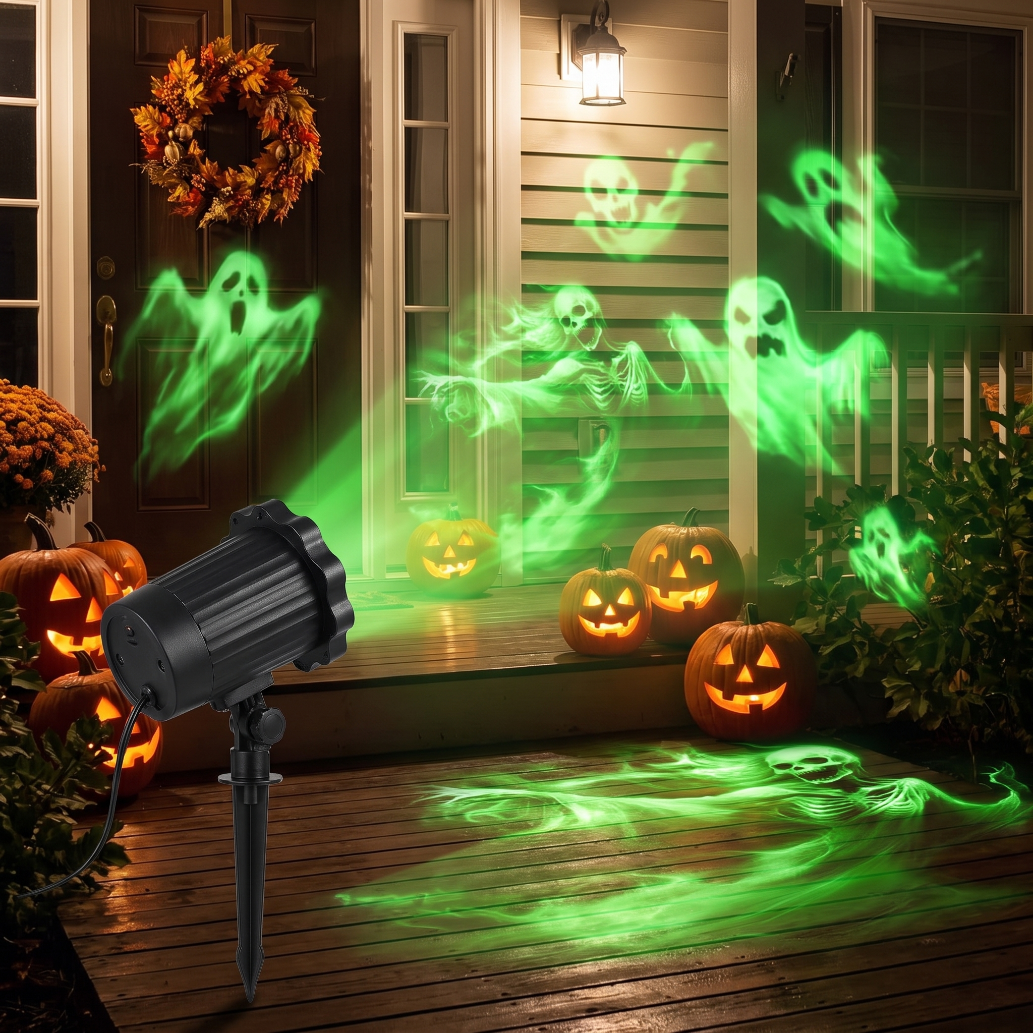 Halloween projector casting ghost and skull patterns on a decorated porch at night