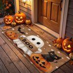 Ghost doormat on a decorated Halloween porch in front of a door