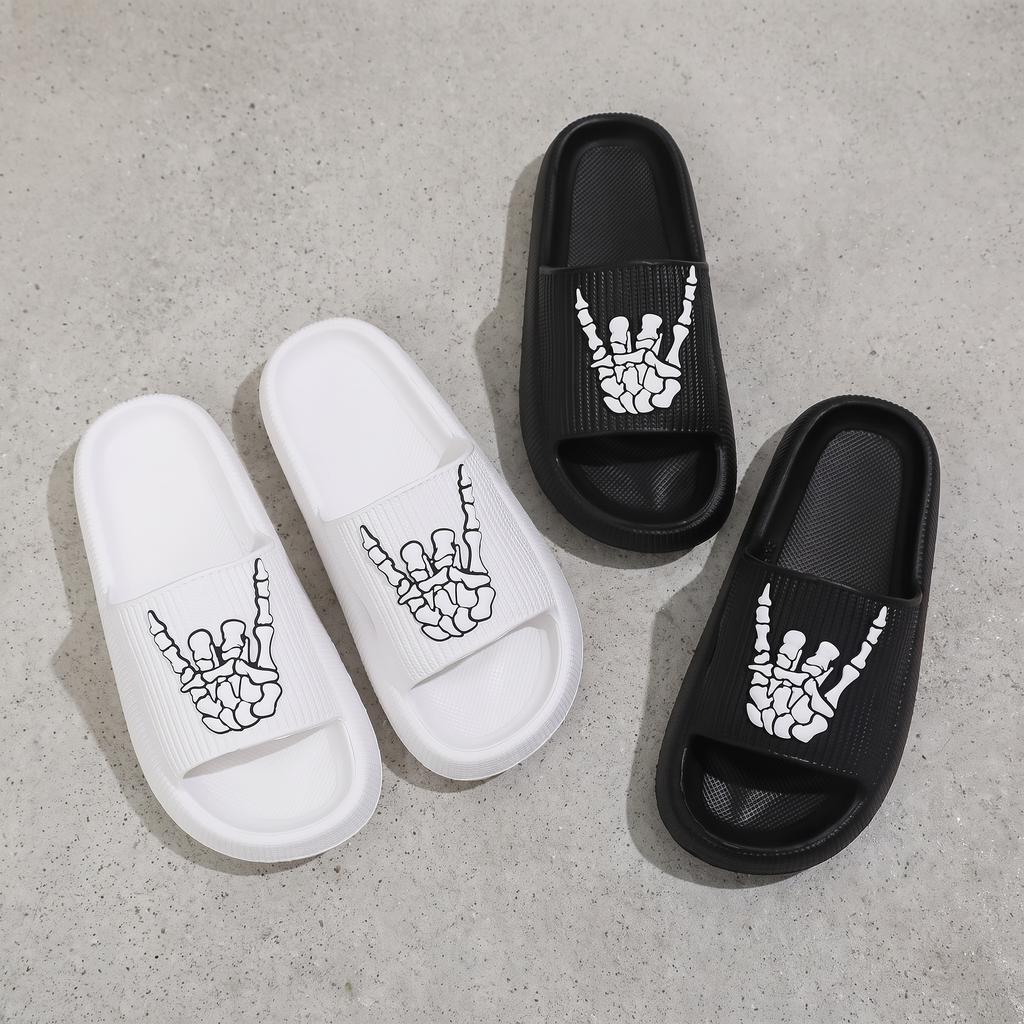 Flat lay of the pair of skull hand slides