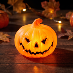 Close up of the glowing ghost face pumpkin lamp