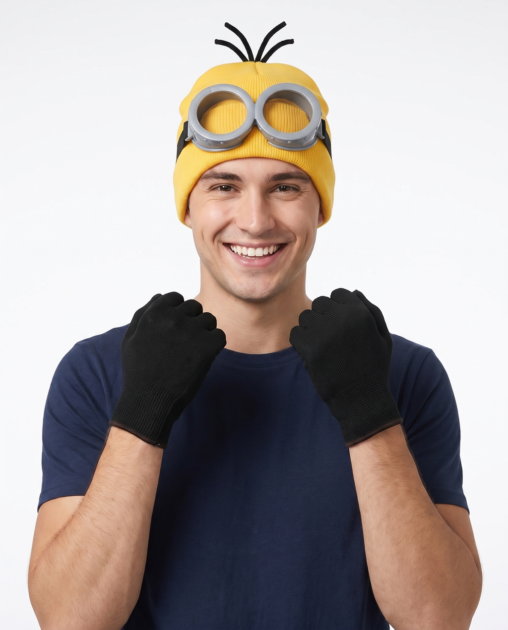 Person wearing yellow beanie, goggles and gloves