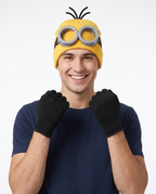 Person wearing yellow beanie, goggles and gloves