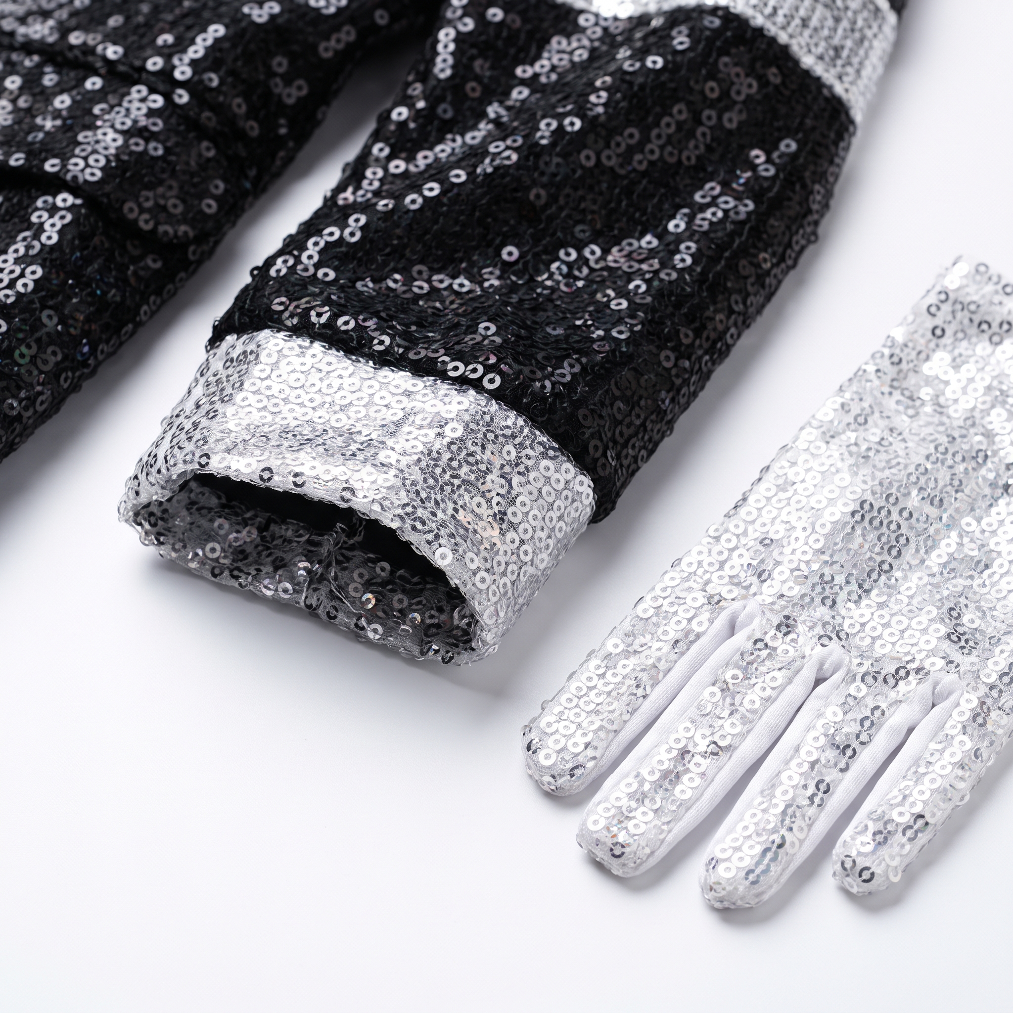 Sequin jacket and glitter glove detail