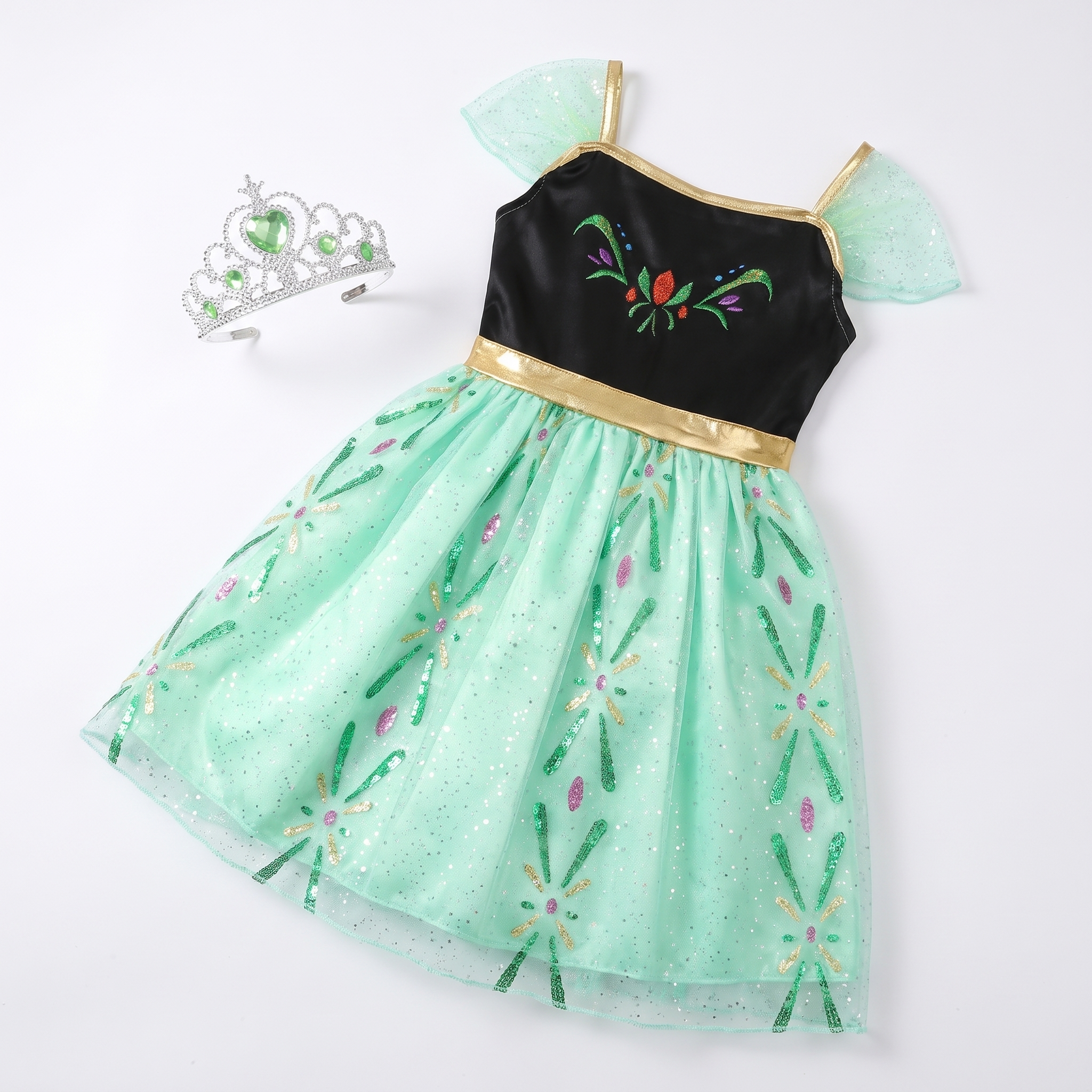 Single princess gown with matching tiara, flat lay