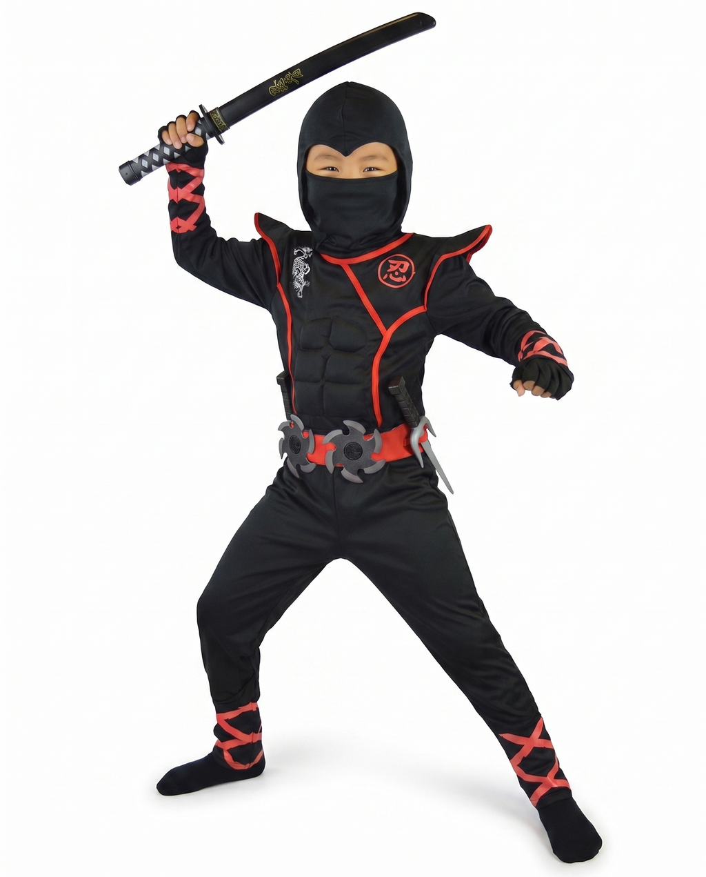 Child wearing black and red ninja costume holding a toy sword