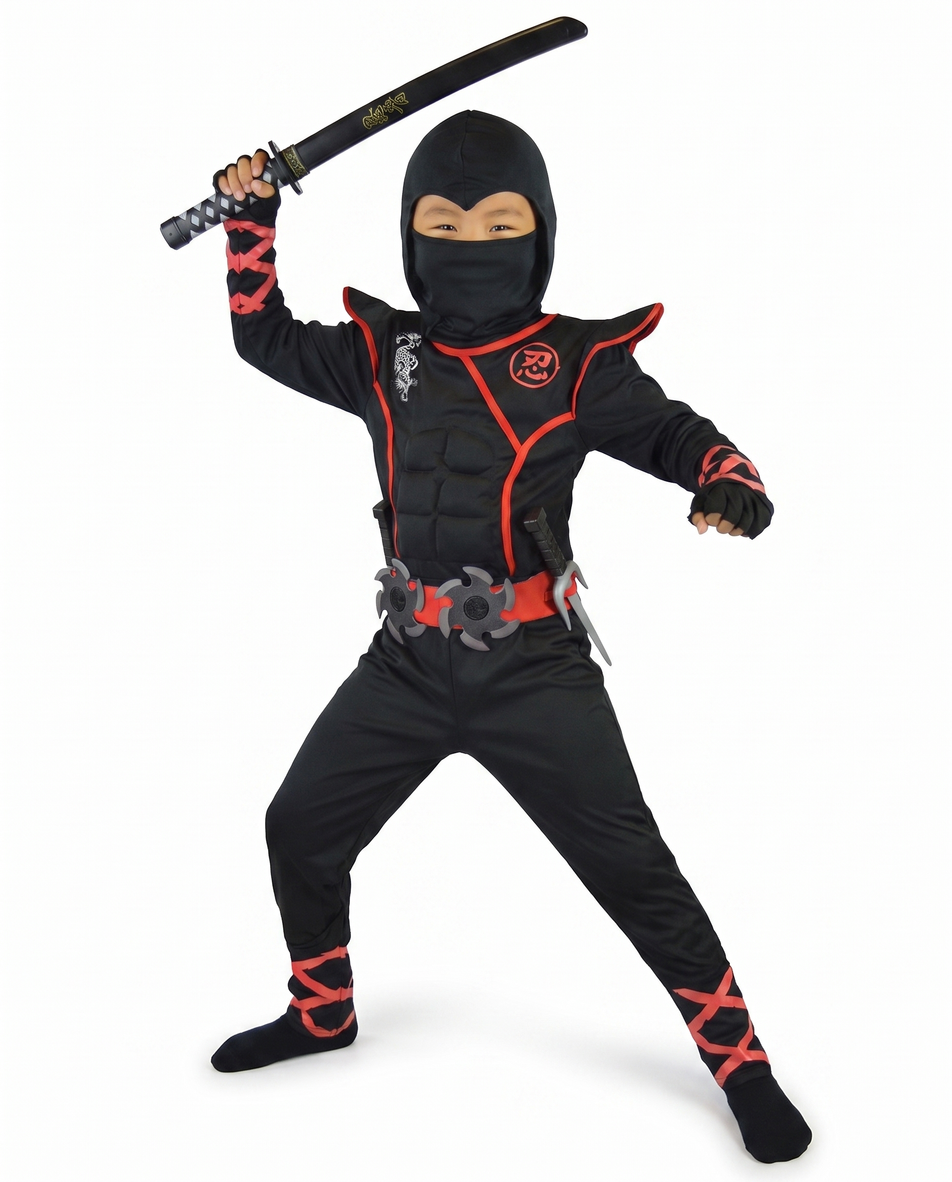 Child wearing black and red ninja costume holding a toy sword