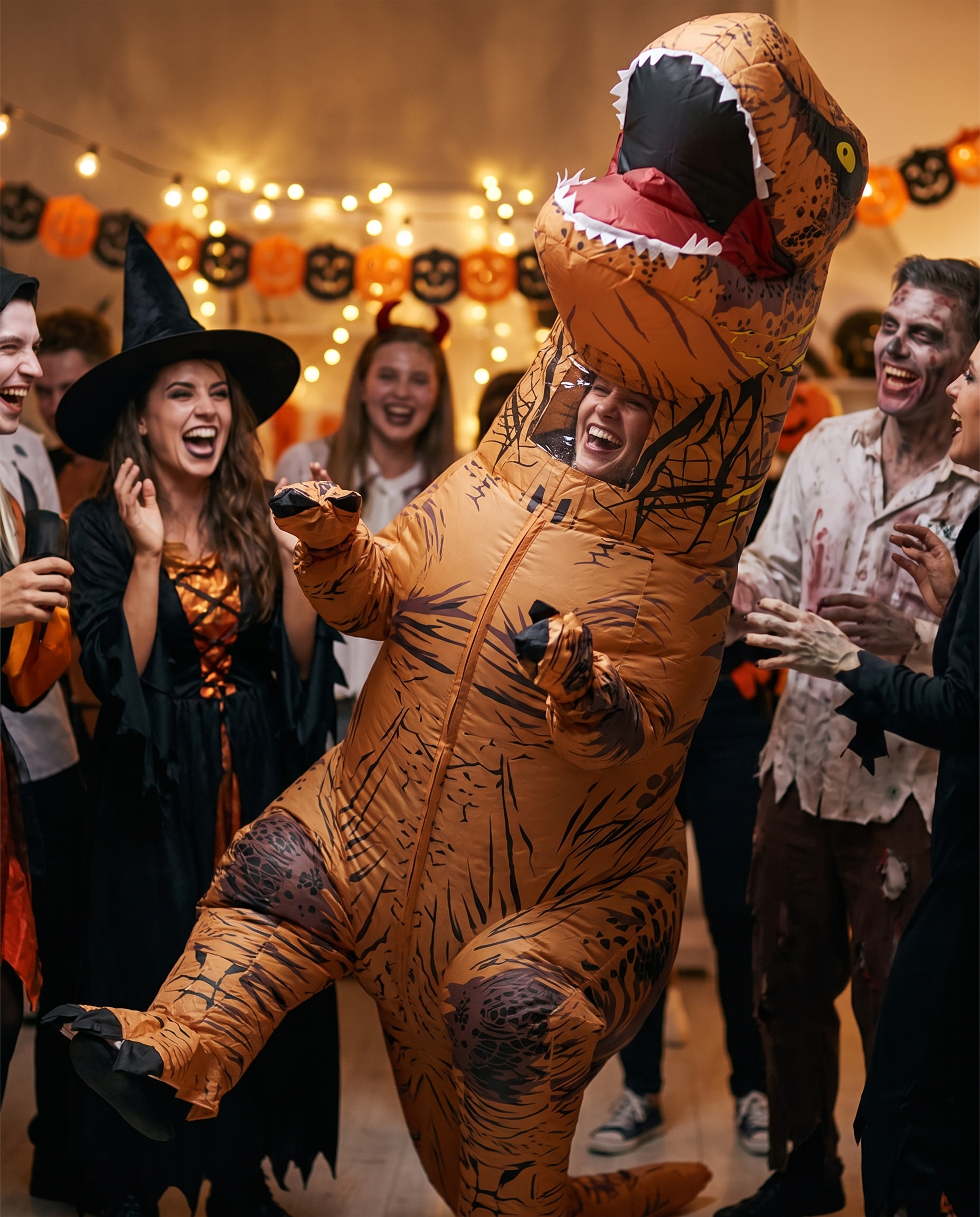Person in T-Rex costume having fun at a Halloween party