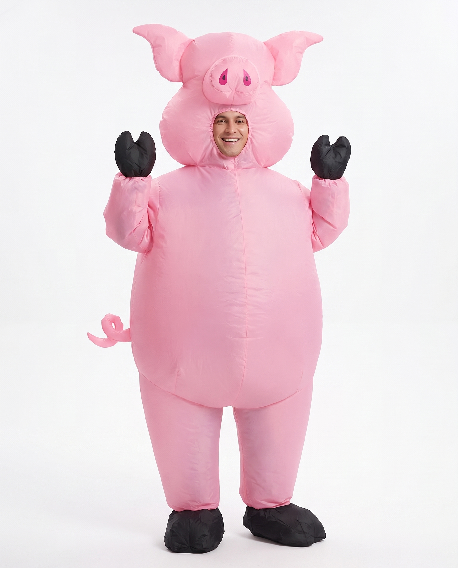 Adult wearing inflatable pink pig costume, front view