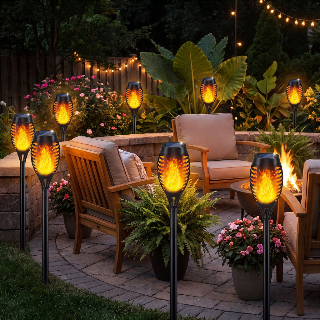 Solar torches around a patio at night