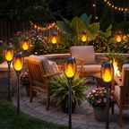 Solar torches around a patio at night