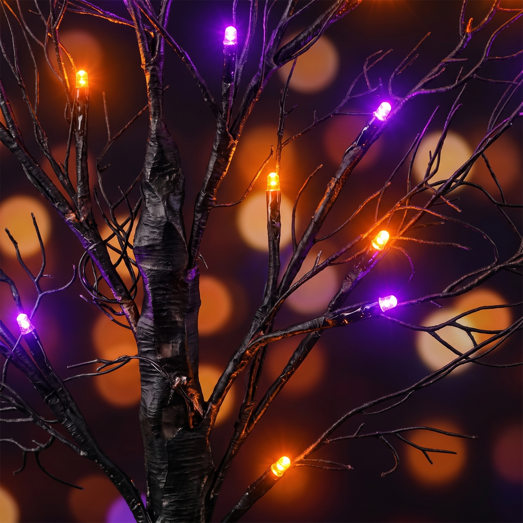 Close-up of orange and purple LED branches