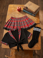 Schoolgirl set flat-lay on a school desk