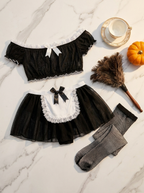 Maid costume flat-lay with feather duster