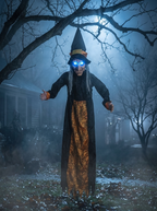 Hanging witch in a foggy yard at night