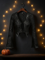 Spider-web top on a boutique hanger